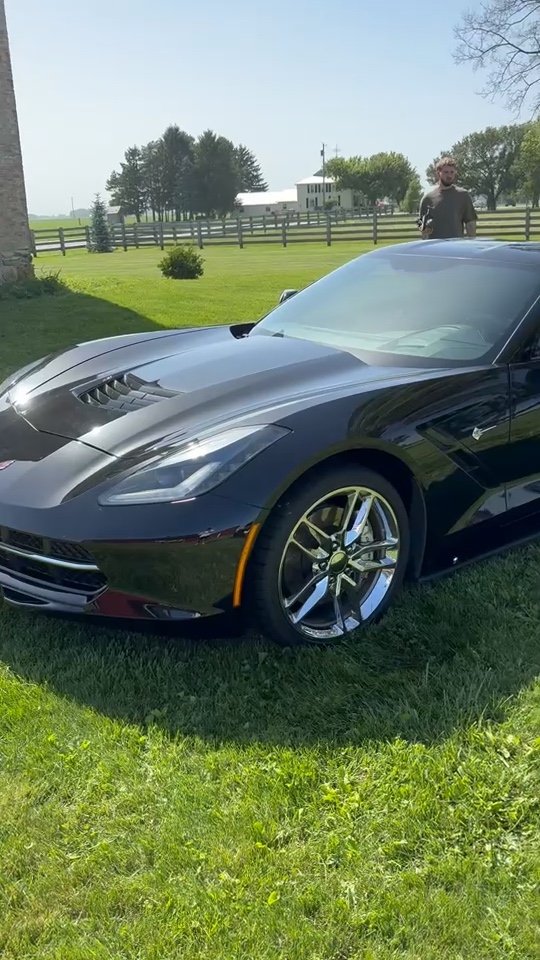 Freshly detailed black Corvette with mirror-gloss paintwork